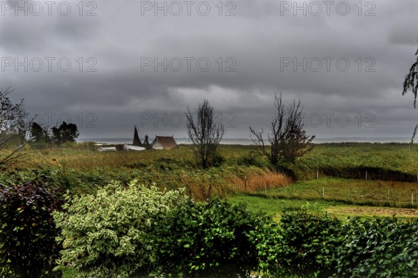 Dark rain clouds (Nimbostratus) over the lagoon, Ahrenshoop, Darß, Mecklenburg-Western Pomerania, Germany
