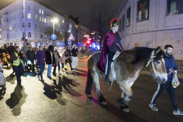 Rider on horseback during the lantern parade for Marting Day in Berlin Moabit on 11.11.2025