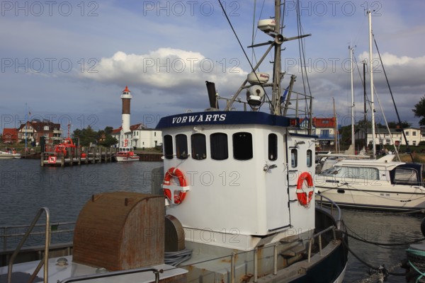 Timmendorf lighthouse on the island of Poel on the Baltic Sea, harbour in the foreground, Nordwestmecklenburg district, Mecklenburg-Western Pomerania, Germany