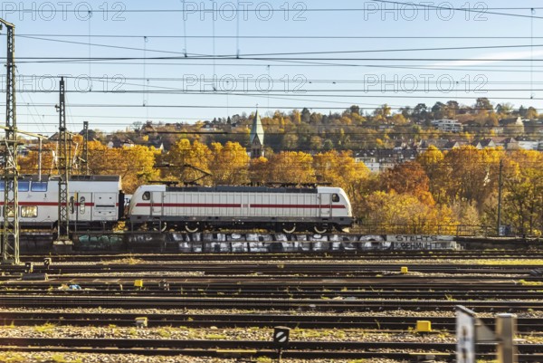 InterCity entering Stuttgart Central Station in autumn. Apron of the track. Stuttgart, Baden-Württemberg, Germany