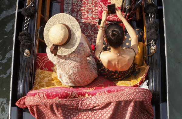 Women in a gondola, Venice, Italy
