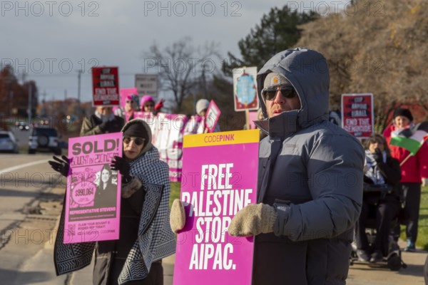 Farmington Hills, Michigan USA - 10 November 2025 - Activists picket U.S. Senator Haley Stevens' suburban Detroit office to protest the senator's acceptance of campaign funding from the American Israel Public Affairs Committee (AIPAC). CodePink is a feminist anti-war organization