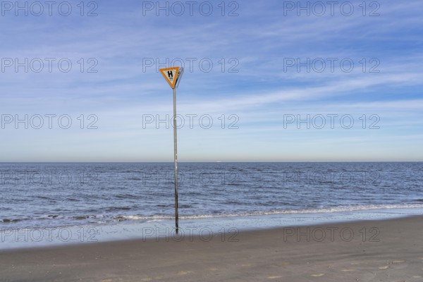 East Frisian North Sea island of Spiekeroog, Wadden Sea National Park, in winter, SOS, emergency call sign, east beach, beach section