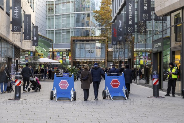 In the run-up to Christmas, the cityscape is characterized by terrorist blockages. Drive-through barriers secure the city center when there are many people on roads and squares due to events. Dorotheen Quartier in Stuttgart, Baden-Württemberg, Germany