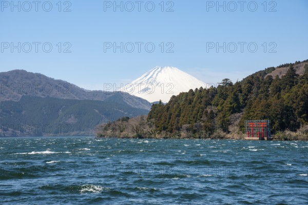 View of Lake Ashi with Mount Fuji volcano and peace torii from Hakone Shrine, Hakone, Japan