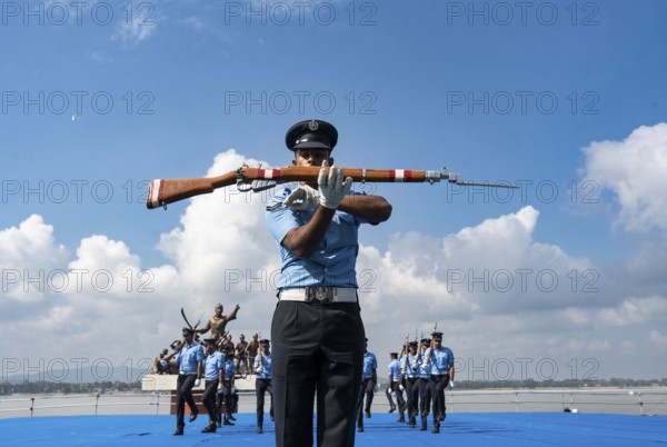 Indian Air Force personnel performs a bayonet drill demonstration on the bank of Brahmaputra river, during rehearsals ahead of the air show organised as part of the 93rd Air Force Day celebrations, on November 5, 2025 in Guwahati, India