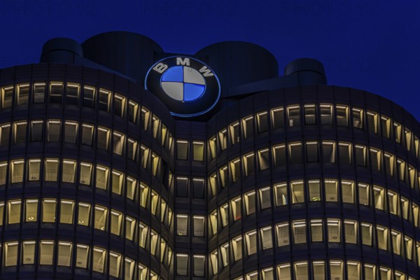 Illuminated offices at BMW headquarters, BMW four-cylinder, Petuelring, Munich, Upper Bavaria, Bavaria, Germany