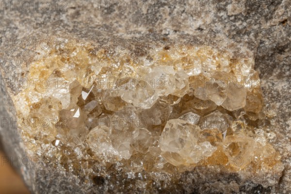 Translucent crystals shimmer in granite rocks. The discovery takes place in summer in a quiet, mountainous region. Bas Rhin, Alsace, France