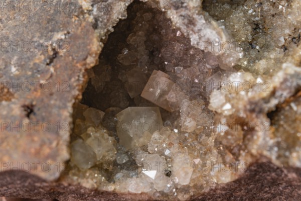Glowing crystals are visible inside the rough stone and reveal a beautiful geological spectacle. Bas Rhin, Alsace, France