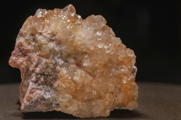 This quartz crystal with its slight orange hue shimmers in the light. Well-defined facets can be seen on its surface. As a work of nature, it attracts everyone's attention. Bas Rhin, Alsace, France