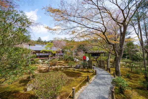 Path in the Japanese garden of Ryoan-ji temple, Zen Buddhist temple complex, in spring, Kyoto, Japan
