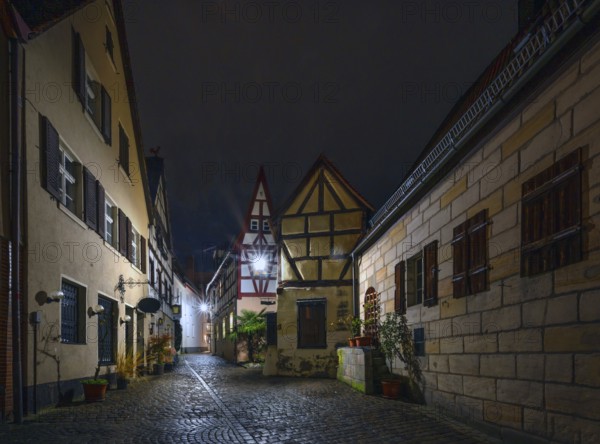 Nocturnal view of an old town alleyway with historic buildings, Lauf an der Pegnitz, Middle Franconia, Bavaria, Germany