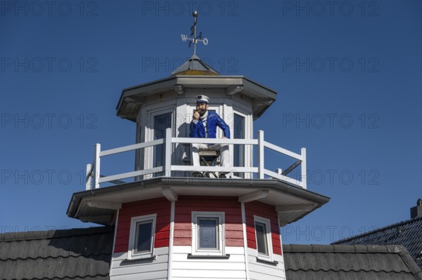 Captain figure on the balcony of a holiday home, Zingst, Darß, Mecklenburg-Western Pomerania, Germany