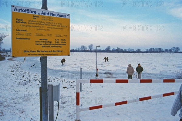 People walk across ice rink, ferry dock, frozen Elbe, Bleckede, Lower Saxony, Germany, January 03, 1997, vintage, retro, old, historic