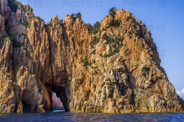 Rock formations and deep blue water in Scandola Nature Reserve, Corsica