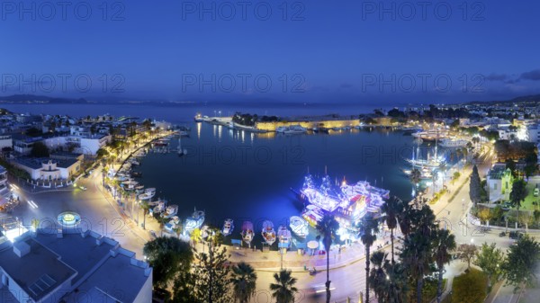 Aerial view, night view, Mandraki harbor, seaport, harbor promenade, ship, ships, illuminated, back fortress, Neratzia, also Nerantzis, Kos town, island of Kos, Dodecanese islands, Greece