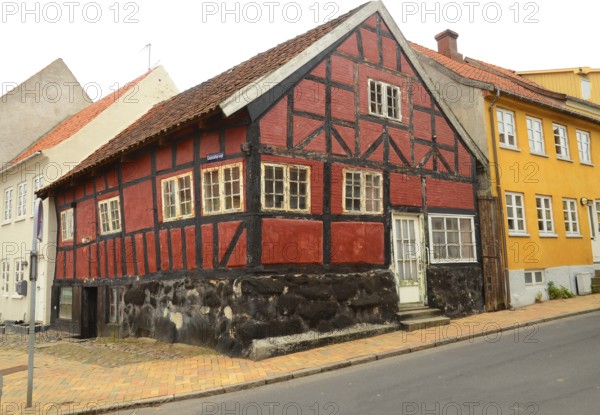 Typical red Danish half-timbered house in Assens, Funen island, Denmark, Scandinavia