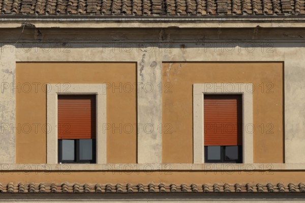 Windows of a building in the city of Rome, Italy