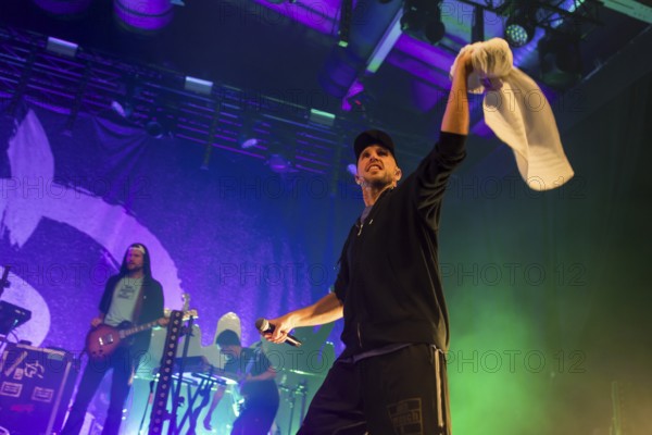 Carlito (Carlos Charlemoine), singer of Irie Révoltés live on Irieunion - Le Re-Tour pour une année! Tour in Berlin's Columbiahalle on 31.10.2025