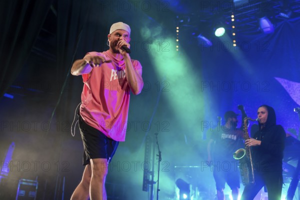 Mal Élevé (Pablo Charlemoine), singer of Irie Révoltés live on Irieunion - Le Re-Tour pour une année! Tour in Berlin's Columbiahalle on 31.10.2025