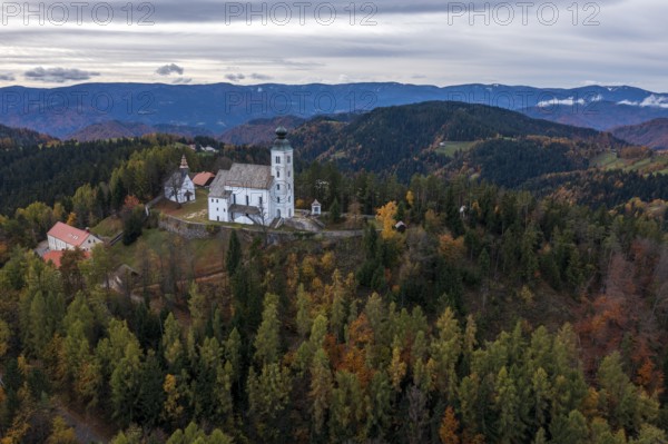 Aerial view, autumn, Church of the Holy Spirit on Osterberg, Cerkev Svetega Duha na Ostrem Vrhu, Slovenia