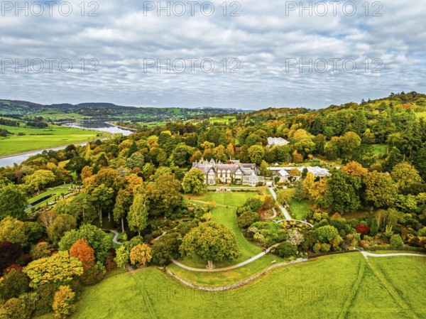 Autumn colours over Bodnant House and Garden from a drone, Conwy River, Colwyn Bay, Conwy, Wales, England, United Kingdom