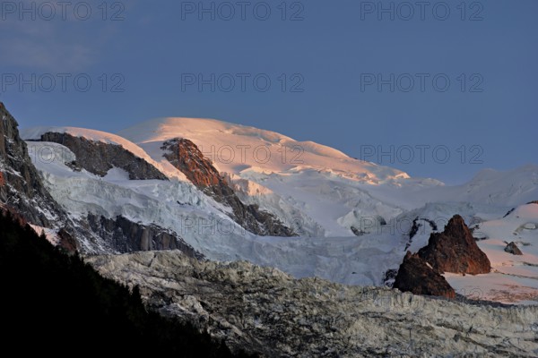 Snow-covered Mont-Blanc in the light of the setting sun, Chamonix-Mont-Blanc, Haute-Savoie, France