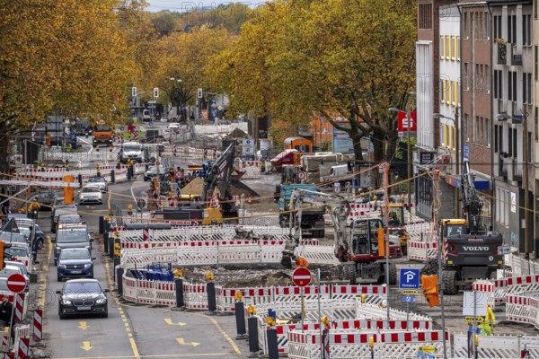 Large-scale construction site on Alleestrasse in downtown Bochum, road construction, construction of new cycle lanes, sidewalks, road surfaces, renewal of canals and water collection systems, trenches, for rainwater, greening, sustainable and modern road conversion, North Rhine-Westphalia, Germany
