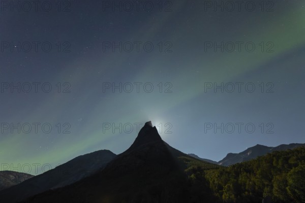 National mountain of Norway - Stetind in the Nordland under auroras and a full moon