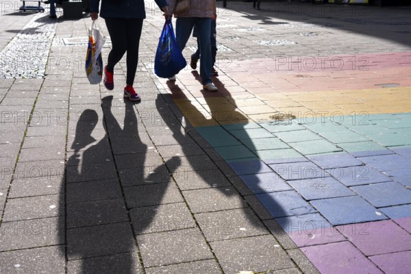 Shadows of passers-by shopping in the city center, Essen, North Rhine-Westphalia