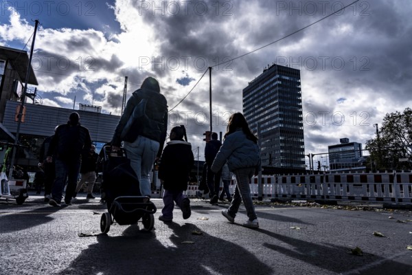 Passers-by in downtown Essen at the main train station, North Rhine-Westphalia, Germany