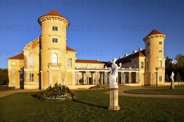 Rheinsberg Castle, front in late evening light, prime example of Friederician Rococo, Ruppiner Land, Brandenburg, Germany