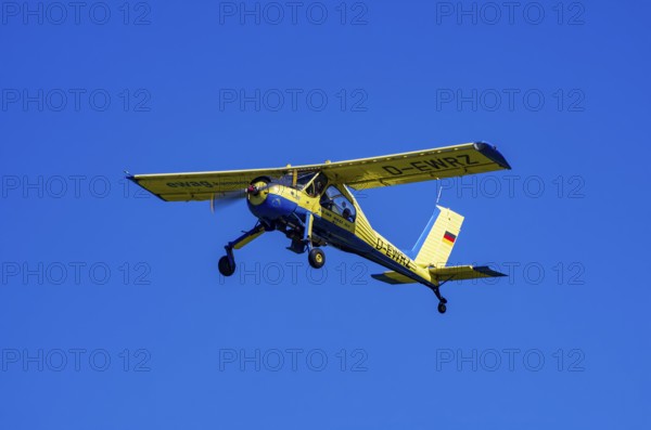 A PZL-104 Wilga-35A sport aircraft from Fliegerklub Kamenz with registration D-EWRZ during a flight demonstration as part of an air show on Rossfeld in Metzingen-Glems, Baden-Württemberg, Germany, for editorial use only