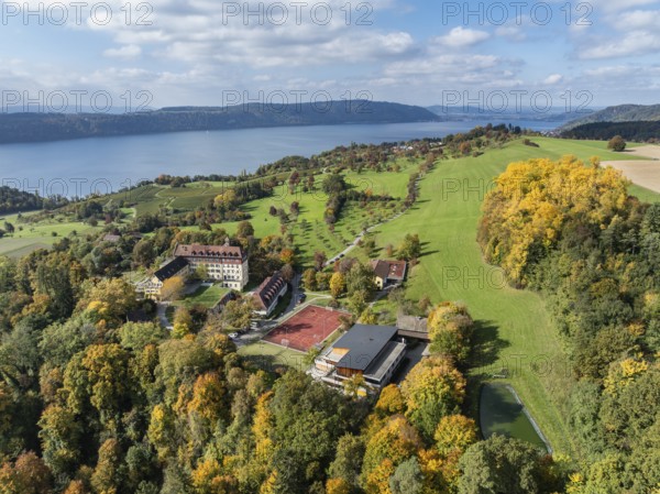 Aerial view of Lake Constance, Überlinger See, surrounded by autumn vegetation with Spetzgart Castle, Salem International College, Bodanrück on the horizon, Lake Constance District, Baden-Württemberg, Germany