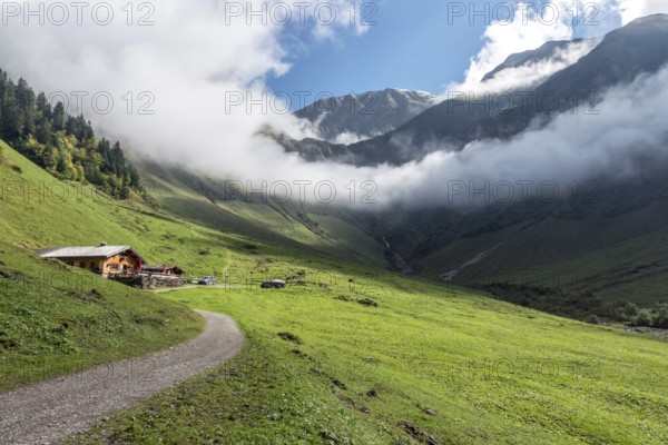 Dietersbachtal valley closure, left Alpe Dietersbach, Nebelschwanden hanging in the valley, mountains of the Allgäu Alps behind, Oberstdorf, Oberallgäu, Allgäu, Bavaria, Germany