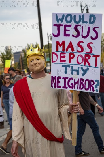 Detroit, Michigan USA - 18 October 2025 - A large crowd gathered for a 'No Kings' rally, protesting President Trump's actions against immigrants and against democratic institutions