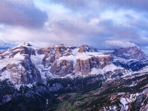 Sella group with fresh snow above the green Val Badia valley, Langkofel on the right, Dolomites, Trentino, South Tyrol, Italy