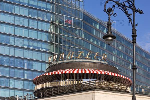Café Kranzler with historic lantern and modern office building on Kurfürstendamm, Charlottenburg, Berlin, Germany