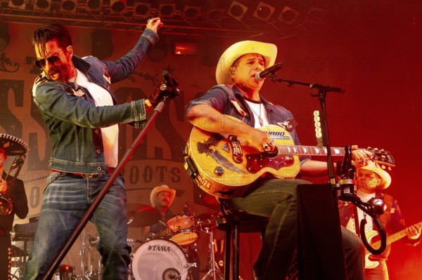 Alec Völkel (Boss Burns) and Sascha Vollmer (Hoss Power), singer of the band The BossHoss on their Back To The Boots Tour 2025 at Capitol Hannover on 3 October 2025