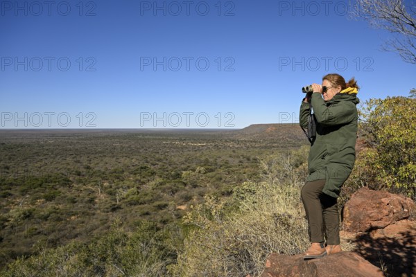 Tourist enjoying the view from Waterberg, Otjozondjupa region, Namibia