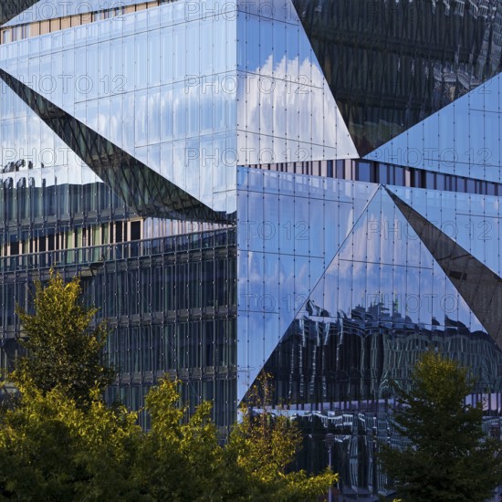 Cube Berlin, cube-shaped office building with folded glass façade reflecting the surroundings, detail, Washingtonplatz, Berlin, Germany