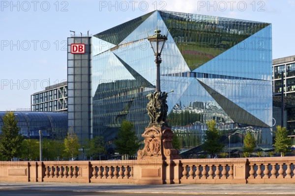 Historic Moltkebrücke with modern Cube Berlin, cube-shaped office building with glass façade reflecting the surroundings, Berlin, Germany
