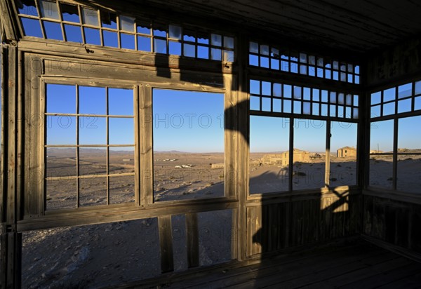 View from a former dwelling house into the desert, Kolmanskop, restricted diamond area, Karas region, Namibia