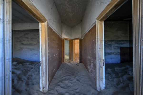 Sand mountains in a former dwelling house, interior photograph, Kolmanskop, restricted diamond area, near Lüderitz, Karas region, Namibia