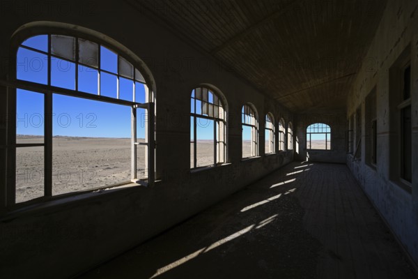 View into the desert from a former dwelling house, Kolmanskuppe, near Lüderitz, Karas Region, Namibia