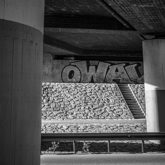 Concrete bridge with graffito in Münsingen on the Swabian Alb, Baden-Württemberg, Germany, for editorial use only