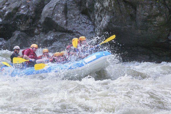 A group of people white water rafting, Costa Rica, Central America