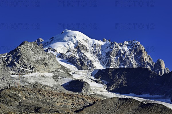 Aiguille des Grands Montets and snow-covered Aiguille Verte, Chamonix-Mont-Blanc, Haute-Savoie, France
