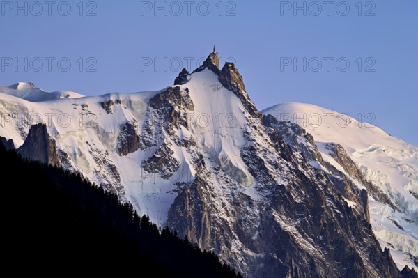 From left: snow-covered Aiguille du Midi, Mont-Blanc, Chamonix-Mont-Blanc, Haute-Savoie, France