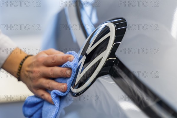 Electric car production in the assembly halls of VW in Zwickau. VW logo, Zwickau, Saxony, Germany